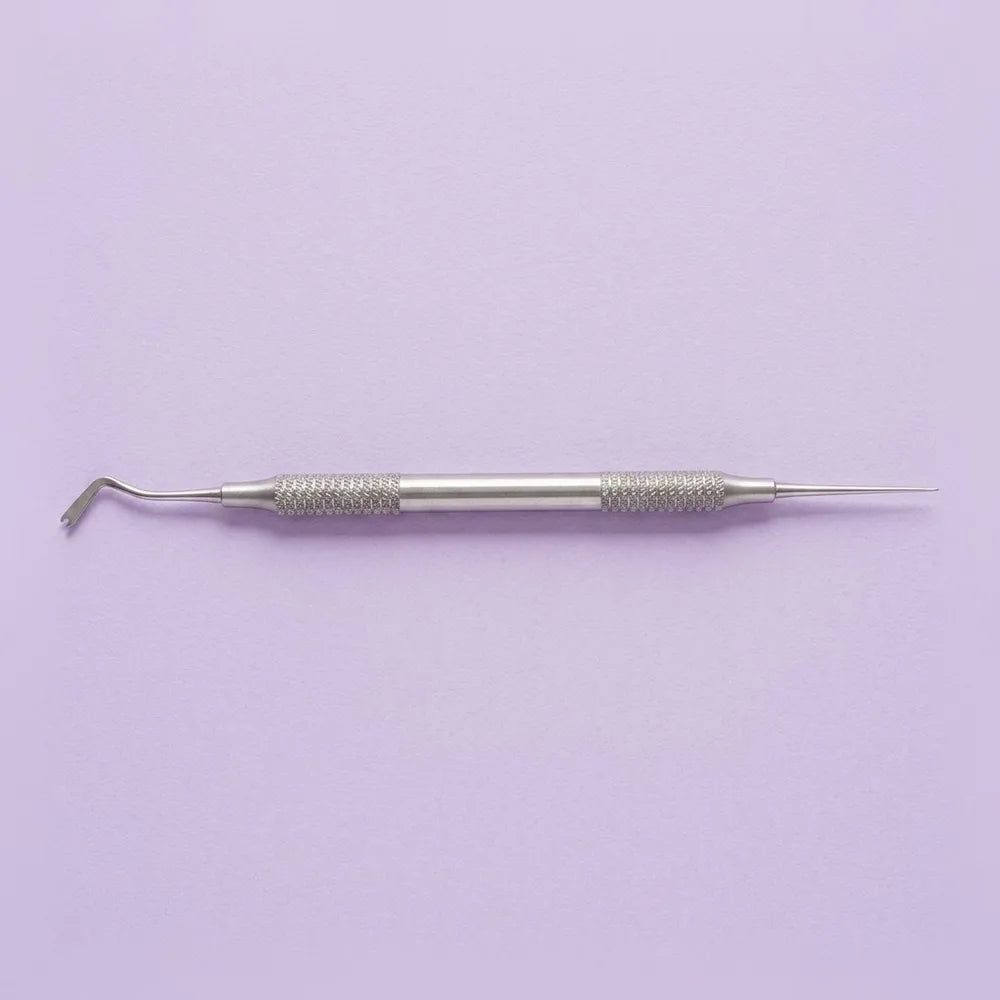 Ligature tucker: ligature tucker for pushing tie ends and archwire into the bracket slot away from soft tissue