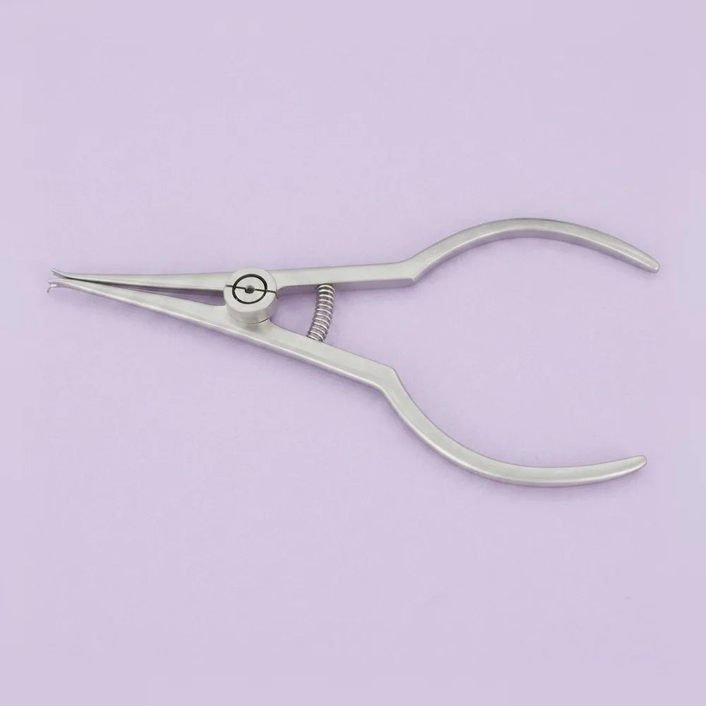 Ligature tying plier: ligature tying plier for twisting and tightening steel ligature ties