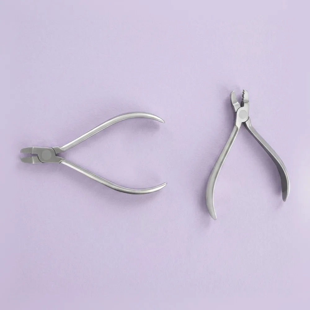 Lingual arch forming plier: lingual arch forming plier for contouring lingual arch and palatal wire to arch form