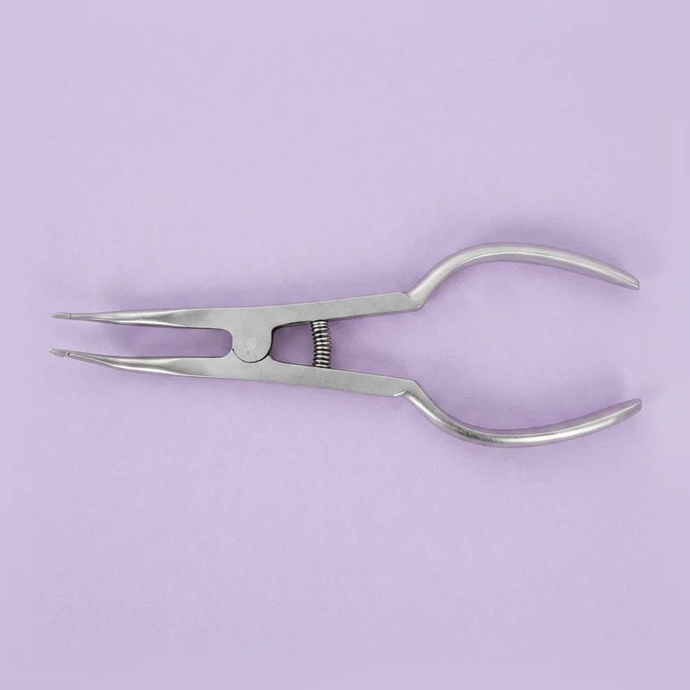 Separator placing plier: separator placing plier for stretching and seating elastic separators interproximally