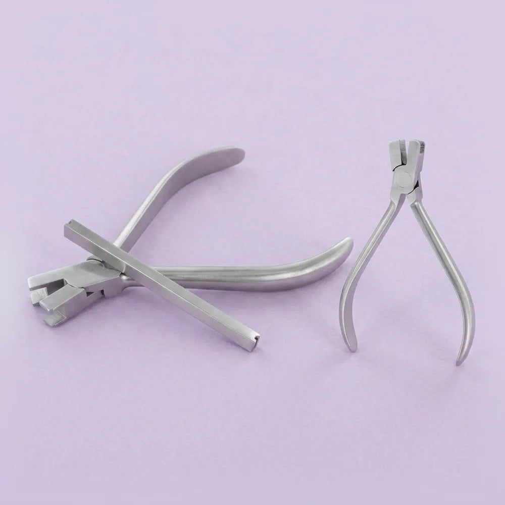 Torque bending plier: torque bending plier for placing third-order bends in rectangular archwire; male and female pairs work together